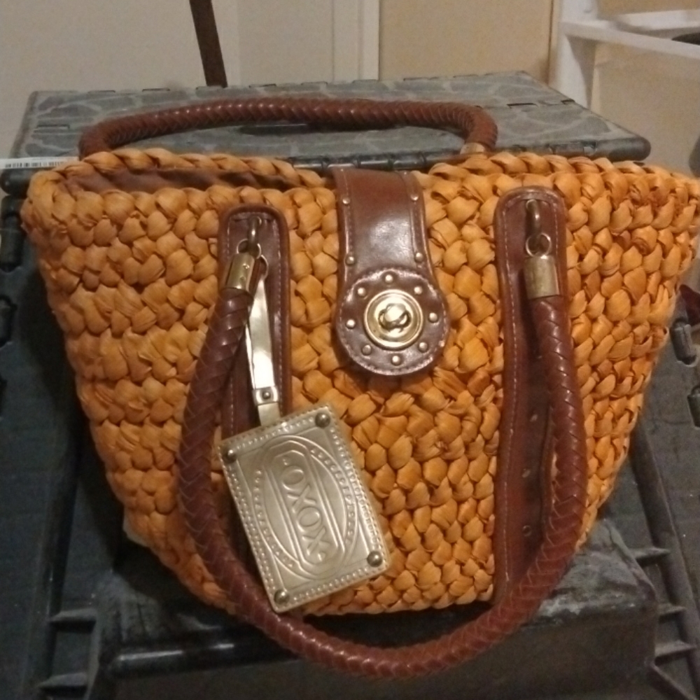 Xoxo bucket bag is large it's wicker brown